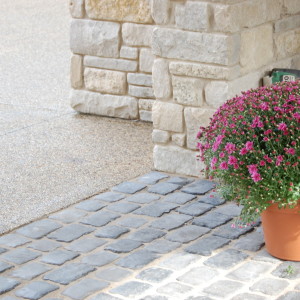 Andrew Wiegand – Exposed aggregate drive court with cobble inlay