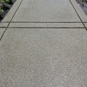 Antique finished concrete walk with custom score joints